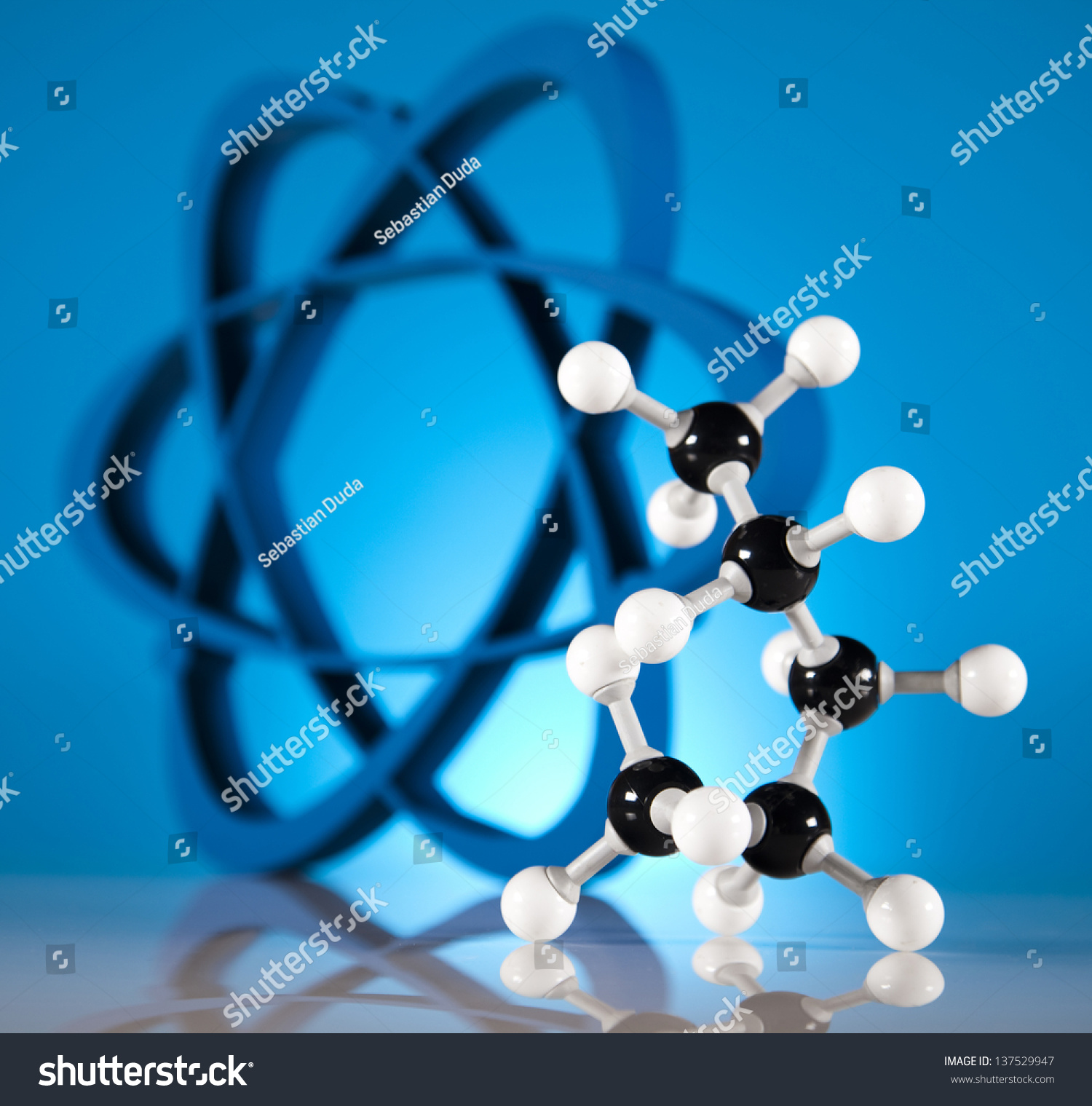 powerpoint-template-atom-molecules-model-ikomjuulo